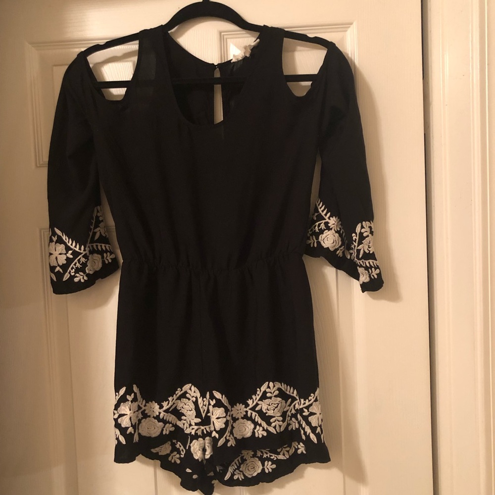 Cute black n white romper with white floral detail